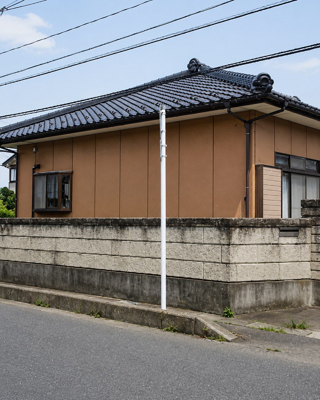 外壁塗装であたたかみのあるオレンジに(Before)