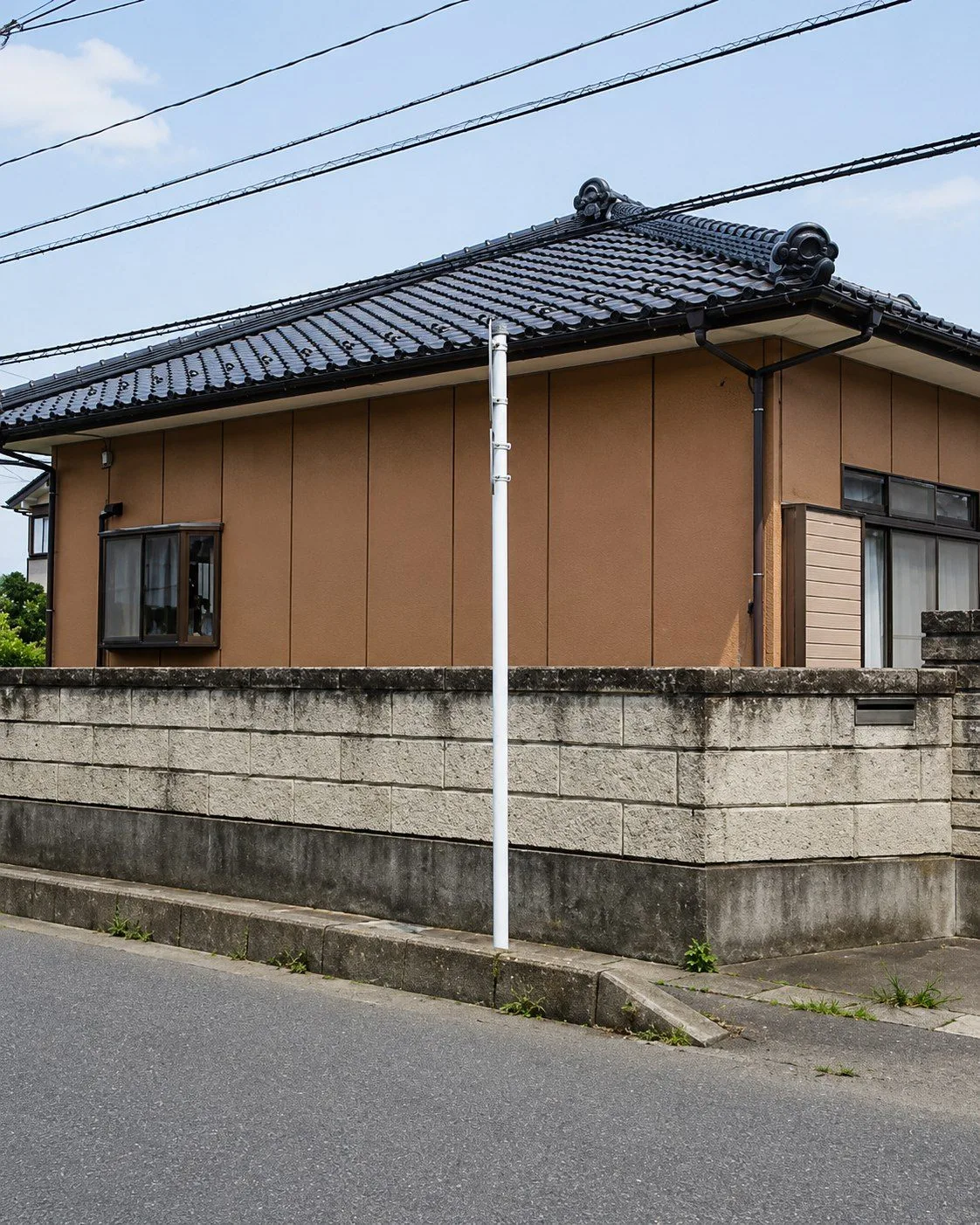 外壁塗装であたたかみのあるオレンジに（Before）